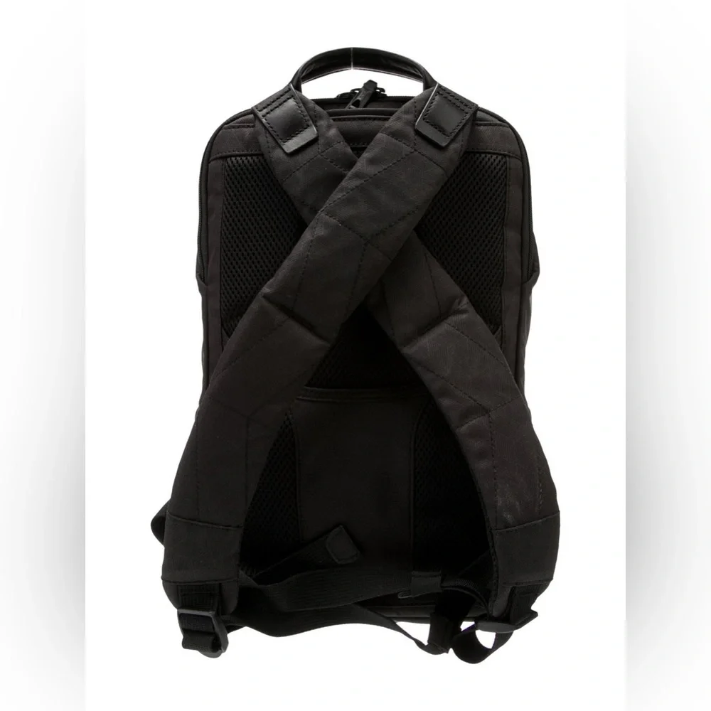 Like new Tumi Tahoe Elwood nylon backpack with leather accent